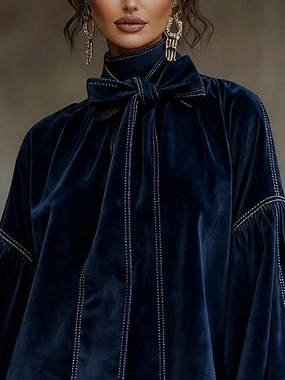 Carolina | Suede dress with a high neck and fringes